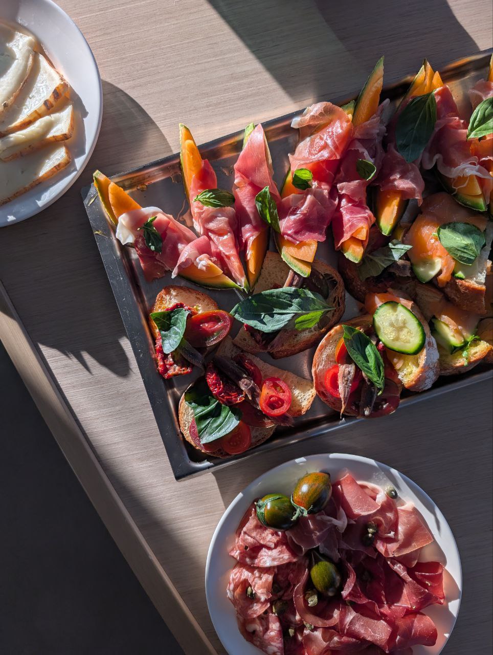 A table of appetizers in the sun